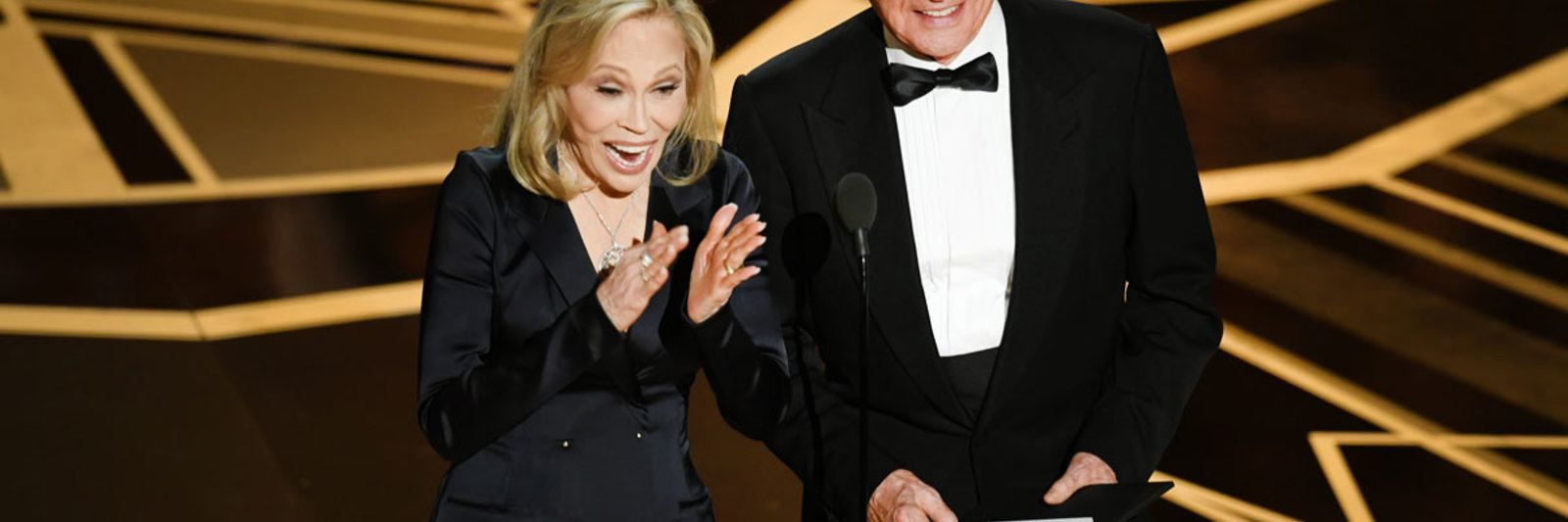 Actors Faye Dunaway (L) and Warren Beatty speak onstage during the 90th Annual Academy Awards at the Dolby Theatre at Hollywood & Highland Center on March 4, 2018 in Hollywood, California. (Photo by Kevin Winter/Getty Images)
