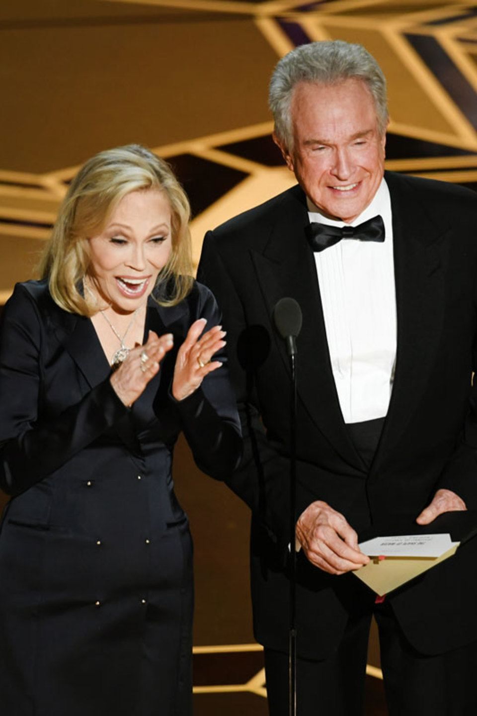 Actors Faye Dunaway (L) and Warren Beatty speak onstage during the 90th Annual Academy Awards at the Dolby Theatre at Hollywood & Highland Center on March 4, 2018 in Hollywood, California. (Photo by Kevin Winter/Getty Images)