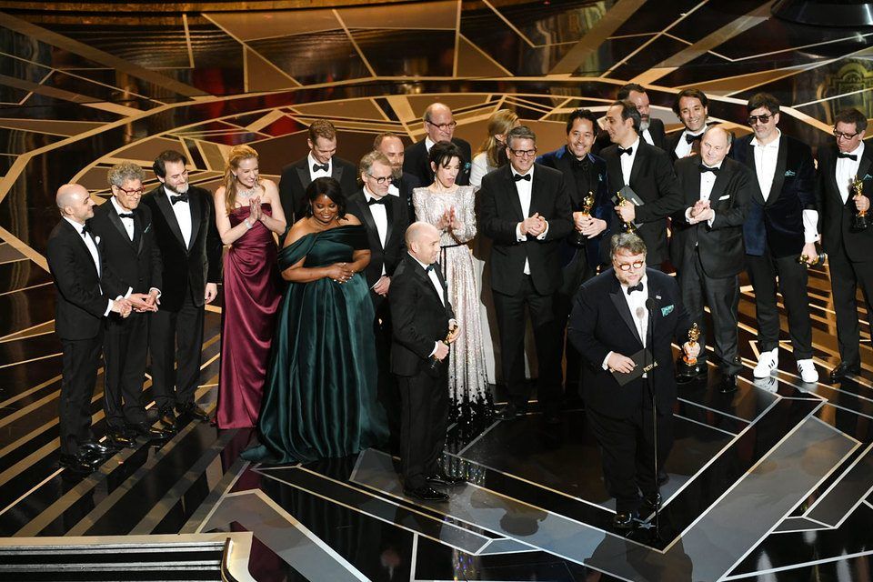 Producer J. Miles Dale (L), director Guillermo del Toro (at microphone) and cast/crew accept Best Picture for 'The Shape of Water' onstage during the 90th Annual Academy Awards at the Dolby Theatre at Hollywood & Highland Center on March 4, 2018 in Hollywood, California. (Photo by Kevin Winter/Getty Images)