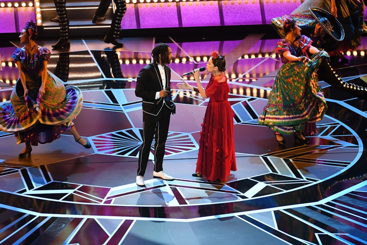 Singers Miguel (L) and Natalia Lafourcade perform onstage during the 90th Annual Academy Awards at the Dolby Theatre at Hollywood & Highland Center on March 4, 2018 in Hollywood, California. (Photo by Kevin Winter/Getty Images)