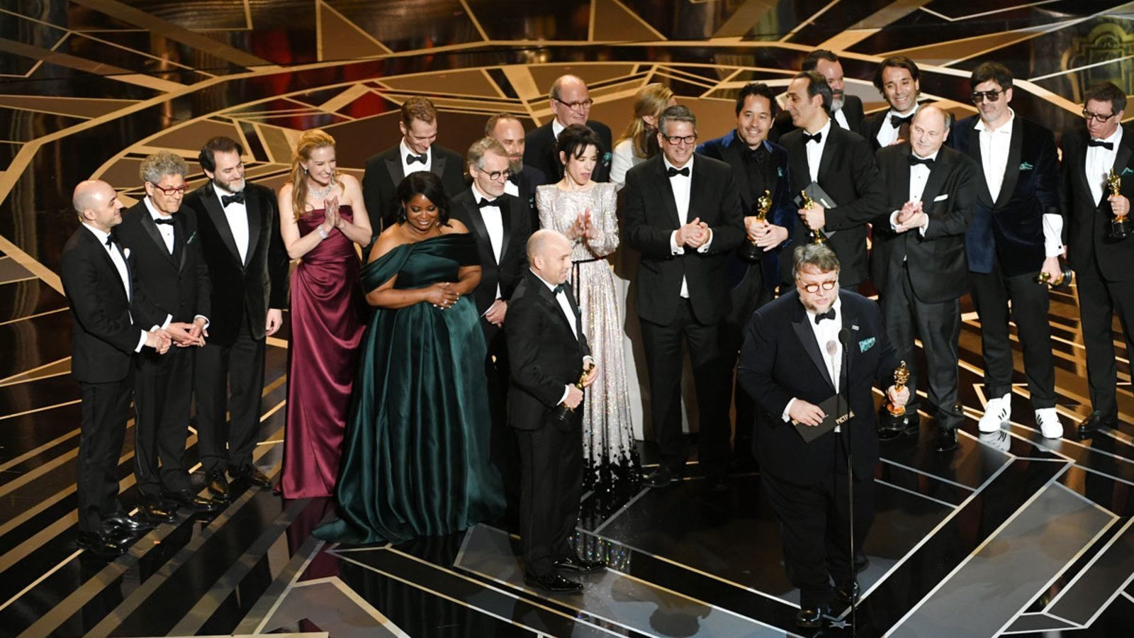Producer J. Miles Dale (L), director Guillermo del Toro (at microphone) and cast/crew accept Best Picture for 'The Shape of Water' onstage during the 90th Annual Academy Awards at the Dolby Theatre at Hollywood & Highland Center on March 4, 2018 in Hollywood, California. (Photo by Kevin Winter/Getty Images)